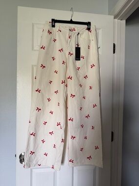 Forever 21 Cream Wide-Leg Jeans with Red Bow Print